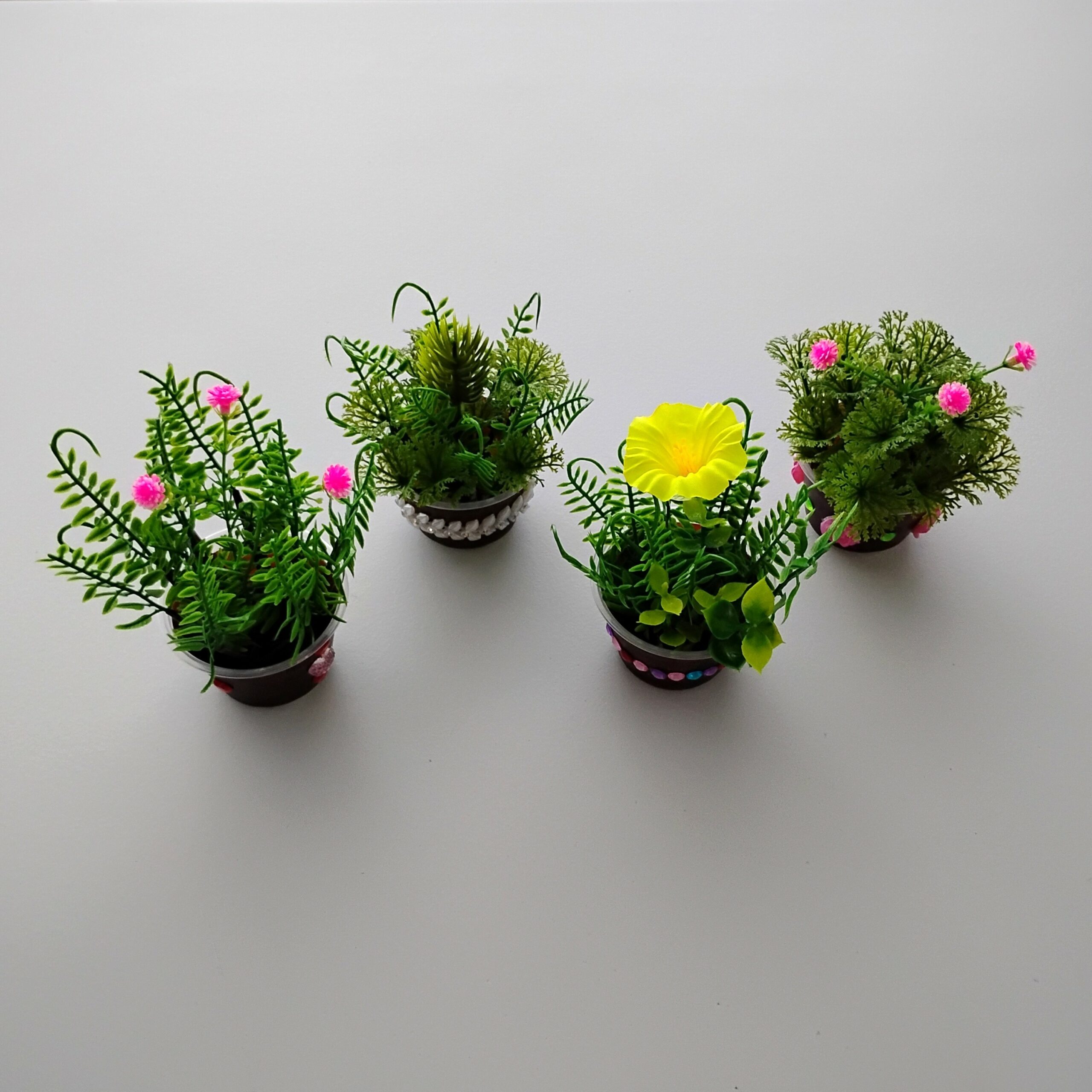 Set of 4 small artificial plants