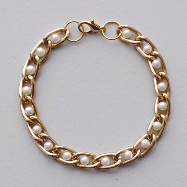 Gold chain bracelet set with pretty little white pearls