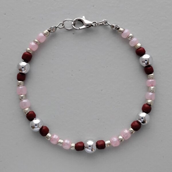 Bracelet with pink, brown and silver beads